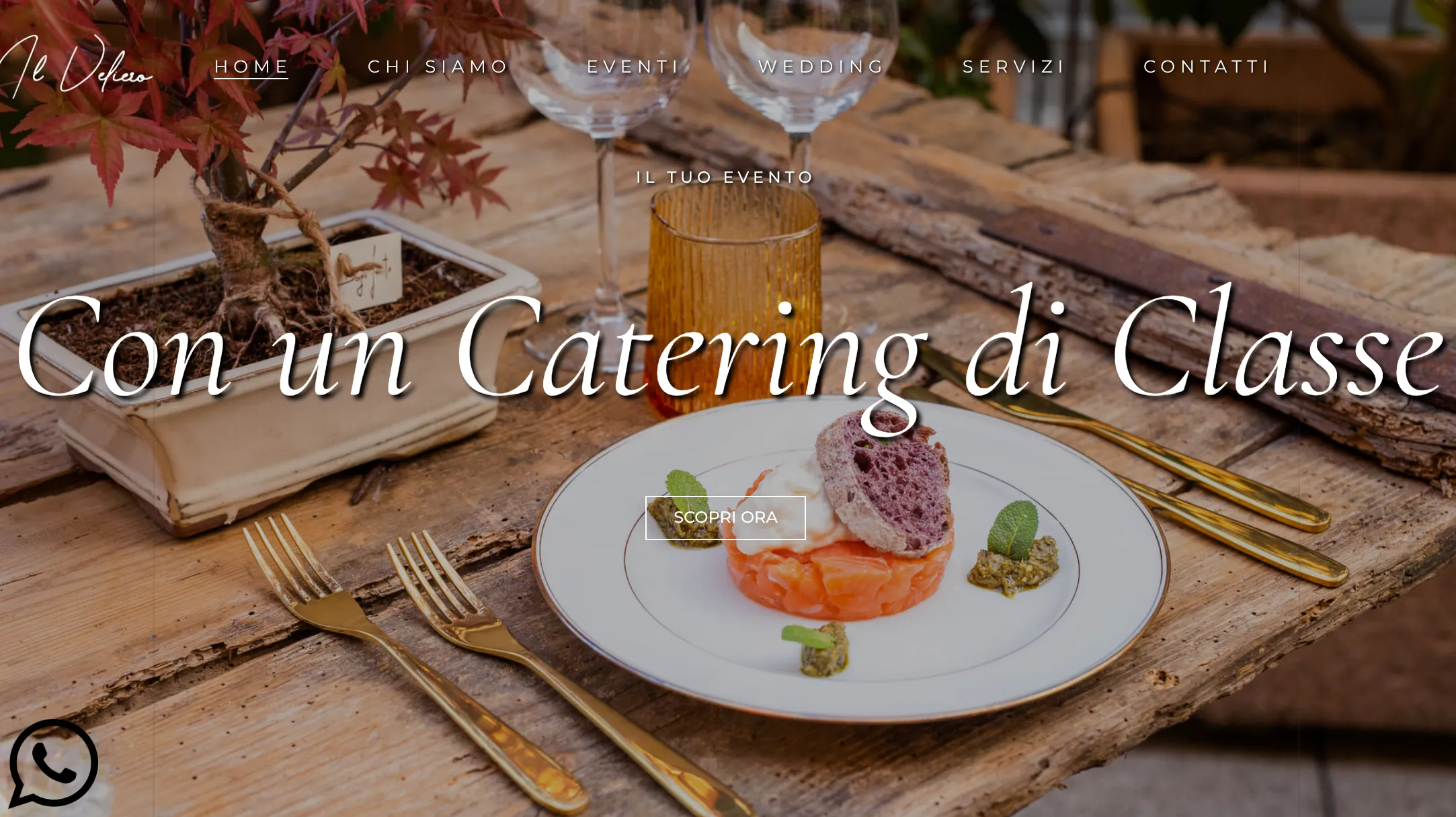The Il Veliero homepage, showing a plated catering dish on a wooden table under the headline 'Con un Catering di Classe'